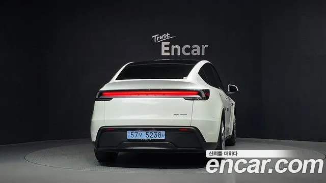 Tesla Model Y — Фото автомобиля 4