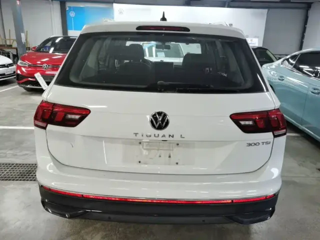 Volkswagen Tiguan L — Фото автомобиля 5