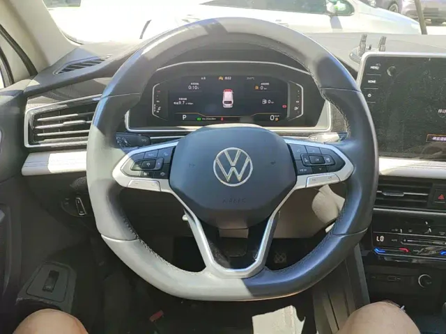 Volkswagen Tiguan L — Фото автомобиля 10