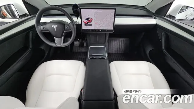 Tesla Model Y — Фото автомобиля 10