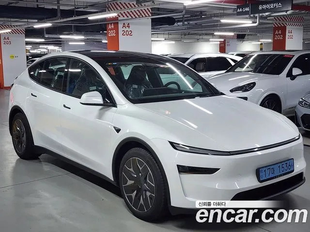 Tesla Model Y — Фото автомобиля 2
