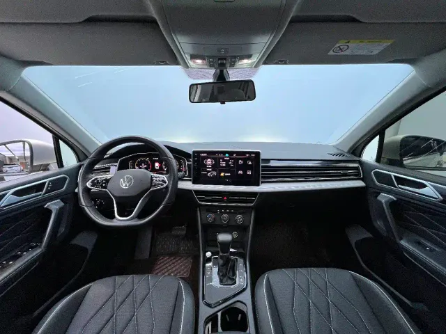Volkswagen Tiguan L — Фото автомобиля 3