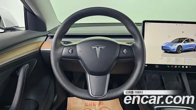 Tesla Model 3 — Фото автомобиля 13