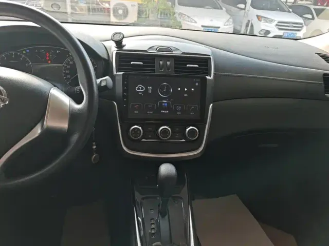 Nissan Tiida — Фото автомобиля 12