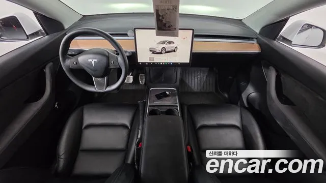 Tesla Model Y — Фото автомобиля 5