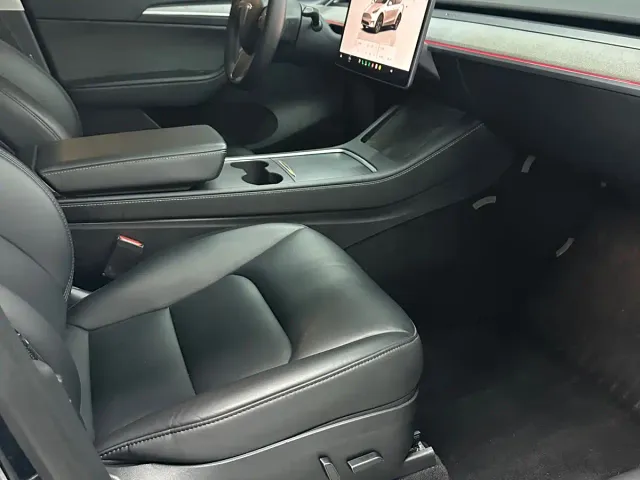 Tesla Model Y — Фото автомобиля 14