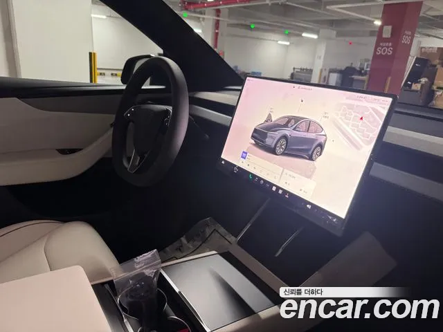 Tesla Model Y — Фото автомобиля 6