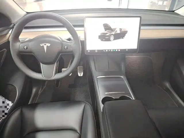 Tesla Model Y — Фото автомобиля 9