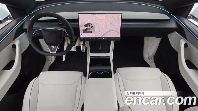 Tesla Model Y — Фото автомобиля 10