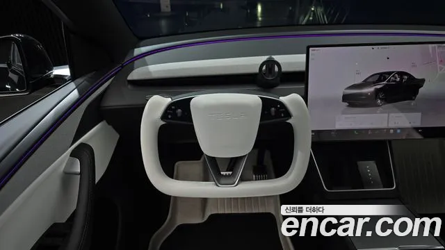 Tesla Model Y — Фото автомобиля 13