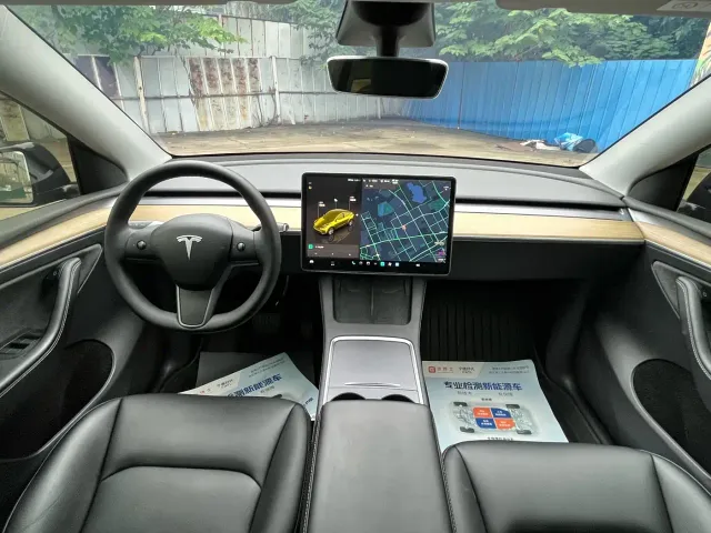 Tesla Model Y — Фото автомобиля 9