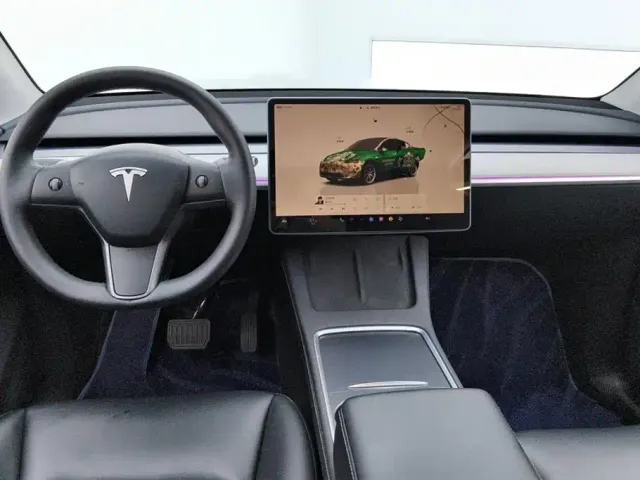 Tesla Model Y — Фото автомобиля 12