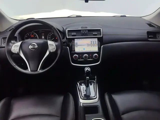 Nissan Tiida — Фото автомобиля 12