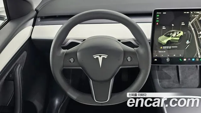 Tesla Model Y — Фото автомобиля 14