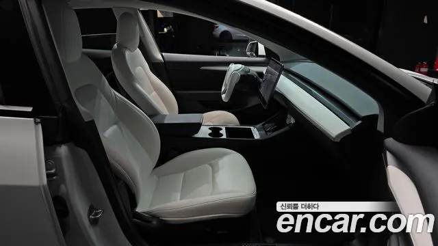 Tesla Model 3 — Фото автомобиля 25