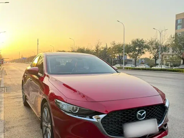 Mazda Axela — Фото автомобиля 12