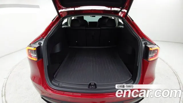 Tesla Model Y — Фото автомобиля 10