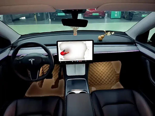 Tesla Model Y — Фото автомобиля 9