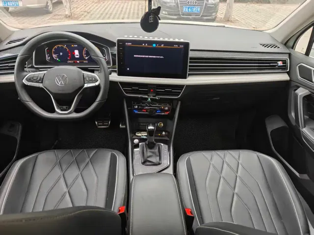 Volkswagen Tiguan L — Фото автомобиля 2