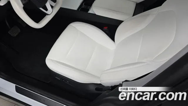 Tesla Model Y — Фото автомобиля 19