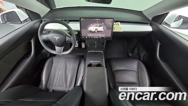 Tesla Model Y — Фото автомобиля 7