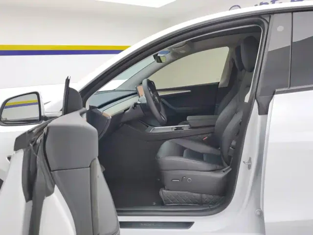 Tesla Model Y — Фото автомобиля 9