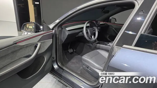 Tesla Model Y — Фото автомобиля 10