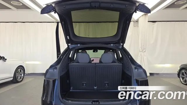 Tesla Model Y — Фото автомобиля 26
