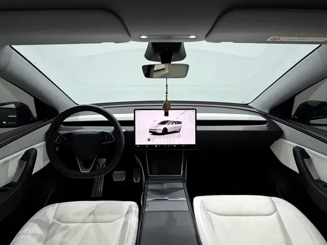Tesla Model Y — Фото автомобиля 7
