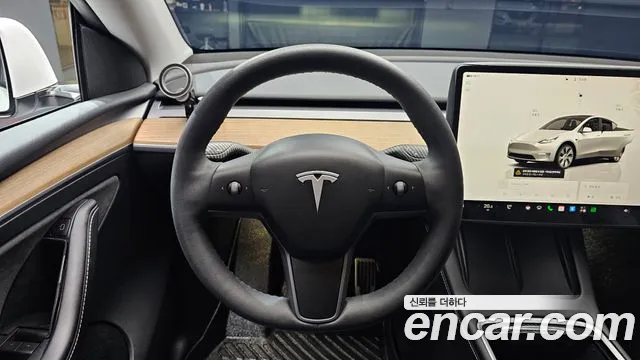 Tesla Model Y — Фото автомобиля 19