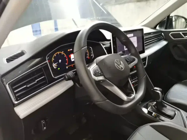 Volkswagen Tiguan L — Фото автомобиля 9