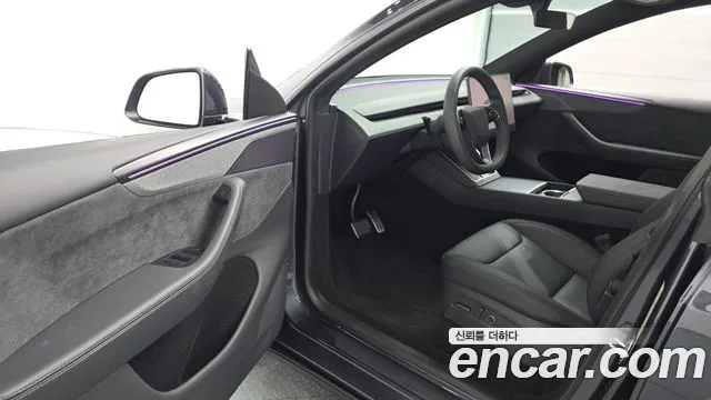 Tesla Model Y — Фото автомобиля 10