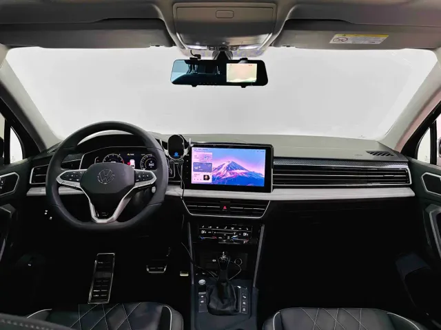 Volkswagen Tiguan L — Фото автомобиля 25