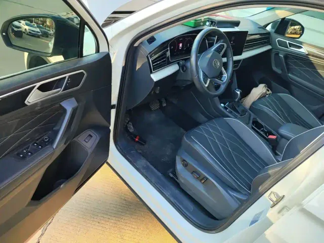 Volkswagen Tiguan L — Фото автомобиля 11