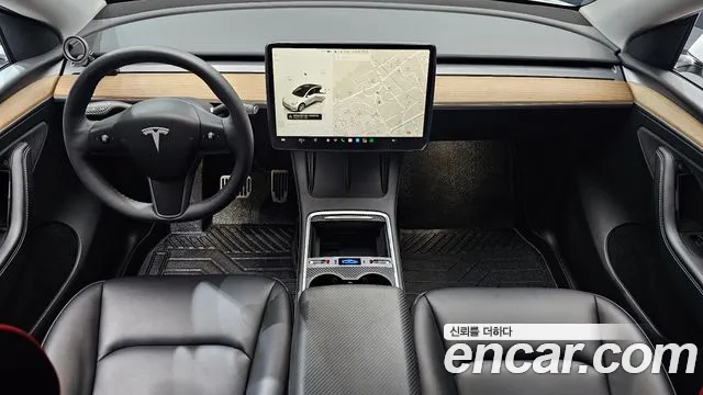 Tesla Model Y — Фото автомобиля 10