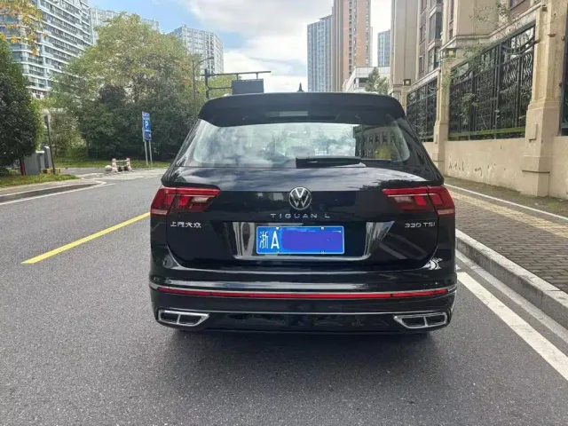 Volkswagen Tiguan L — Фото автомобиля 3