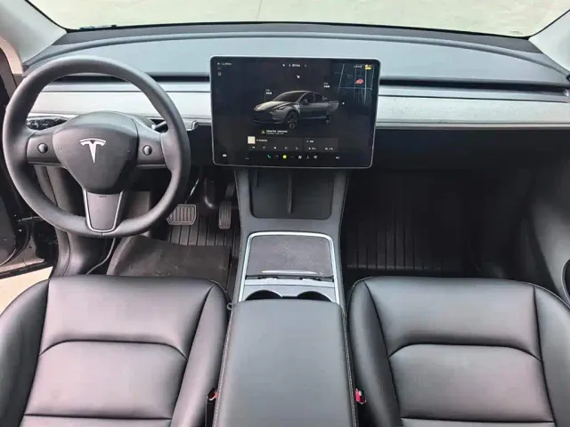 Tesla Model Y — Фото автомобиля 9