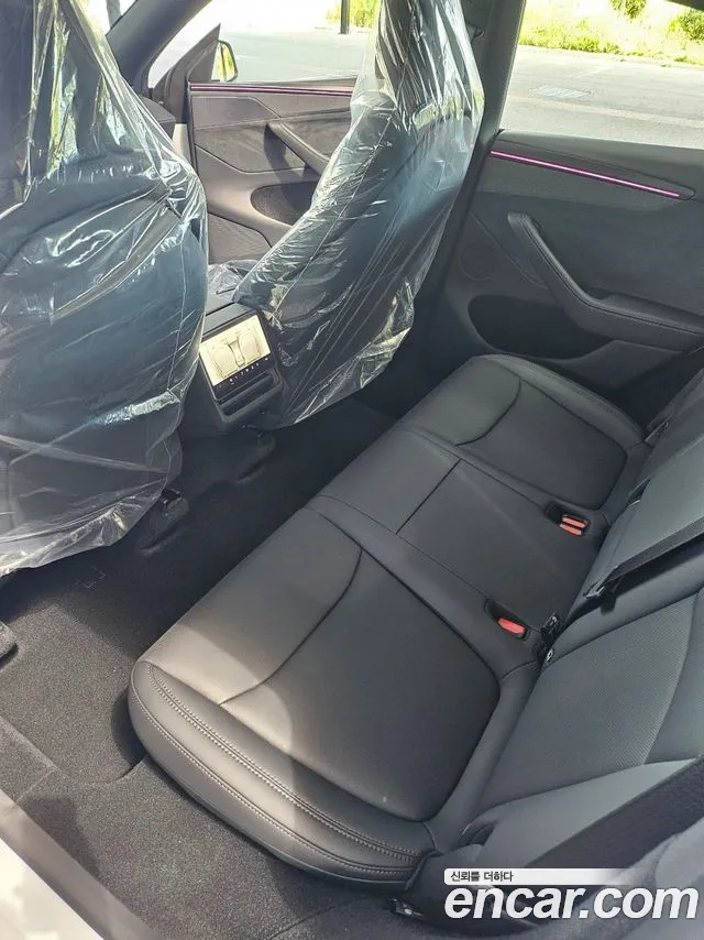 Tesla Model Y — Фото автомобиля 6