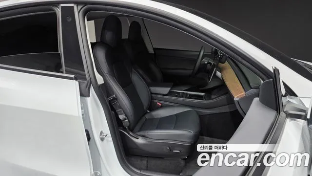 Tesla Model Y — Фото автомобиля 24
