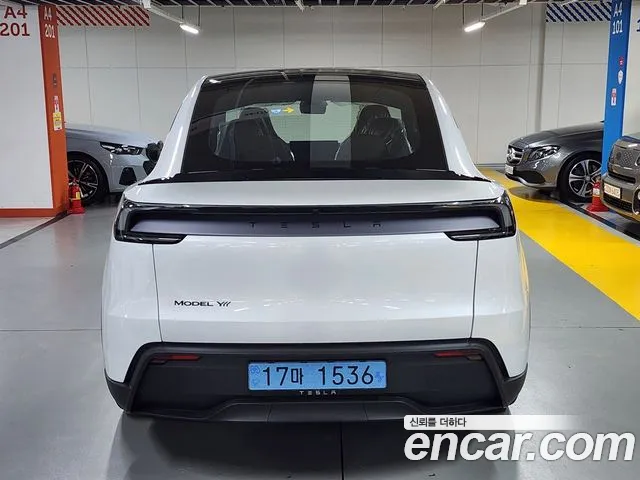Tesla Model Y — Фото автомобиля 4