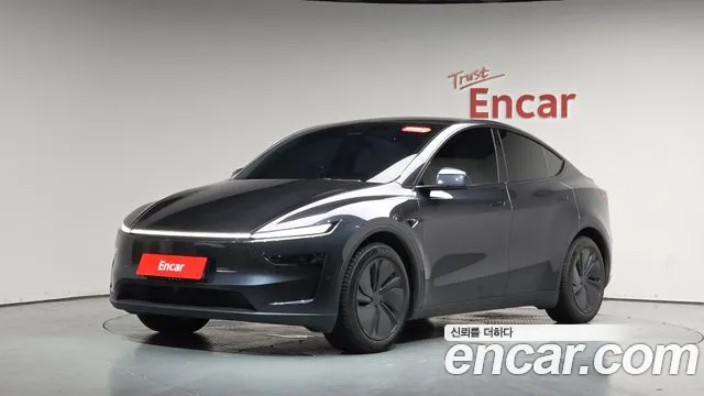 Tesla Model Y — Фото автомобиля 2