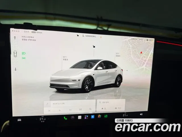 Tesla Model Y — Фото автомобиля 11