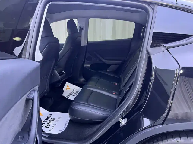 Tesla Model Y — Фото автомобиля 8