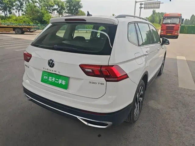 Volkswagen Tiguan L — Фото автомобиля 6