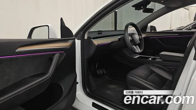 Tesla Model Y — Фото автомобиля 15