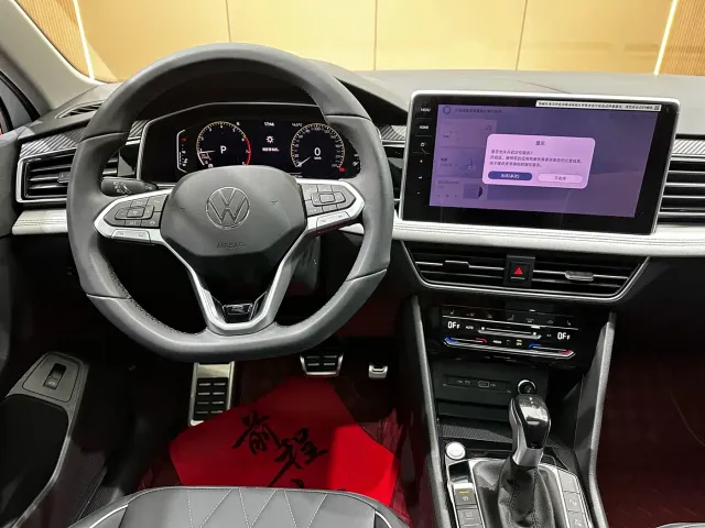 Volkswagen Tiguan L — Фото автомобиля 7