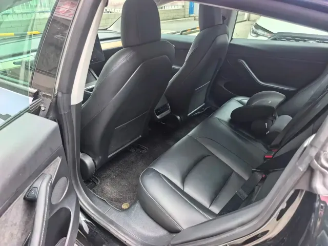 Tesla Model 3 — Фото автомобиля 11