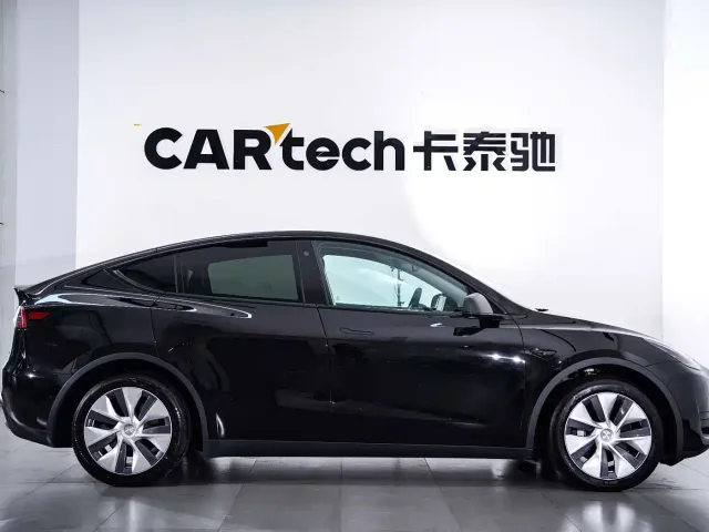 Tesla Model Y — Фото автомобиля 4