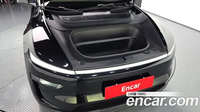 Tesla Model Y — Фото автомобиля 5