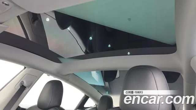 Tesla Model 3 — Фото автомобиля 15